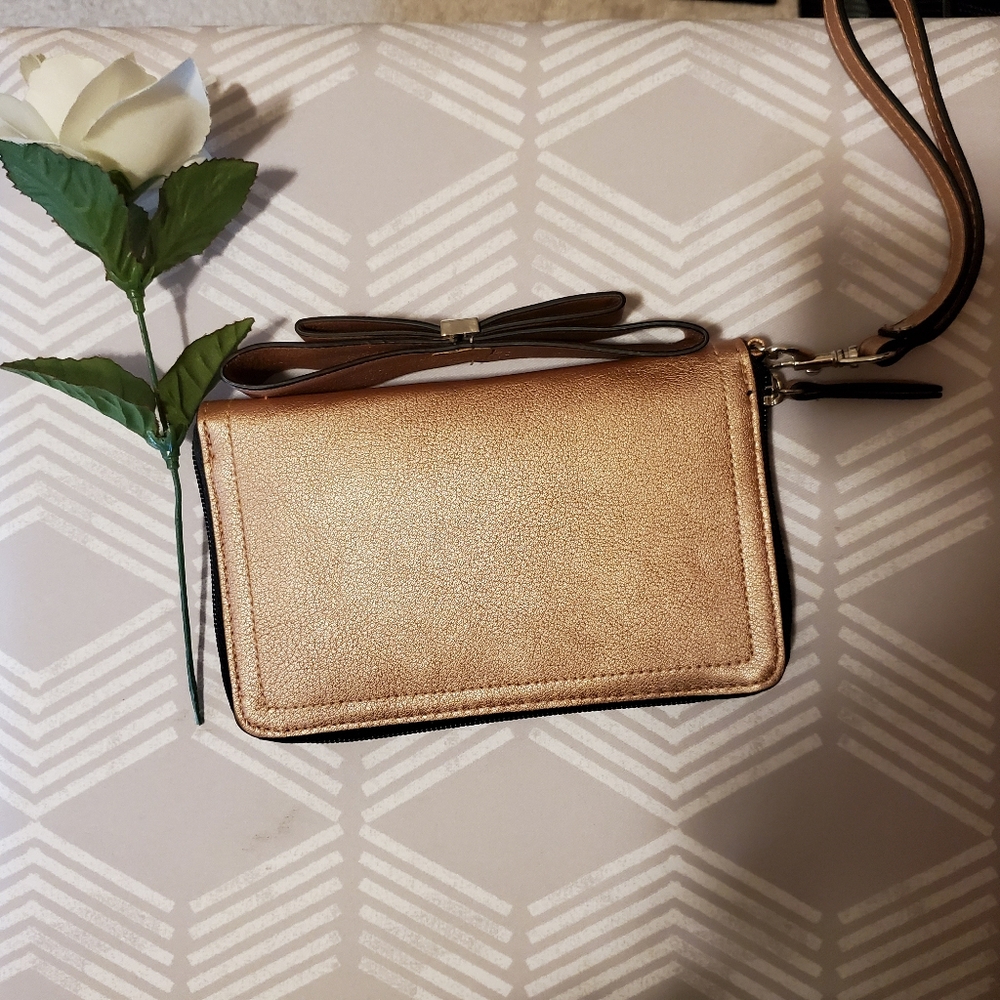 NWOT- Bootlegger rose gold wristlet